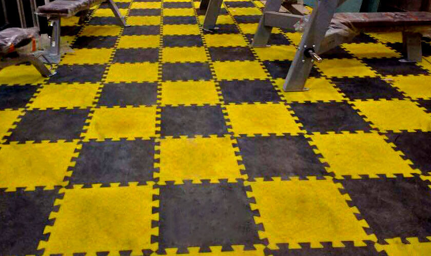 virgin pvc yellow & black interlocking tile flooring
